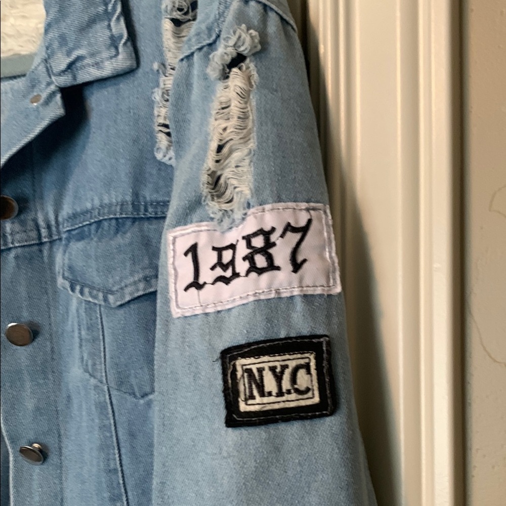 Blue Denim Jacket With Graphic Patch - image 3